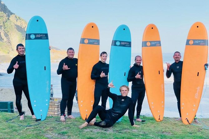 1h15min surfing lessons in Victoria Bay & Wilderness - Equipment included, with less to pack
