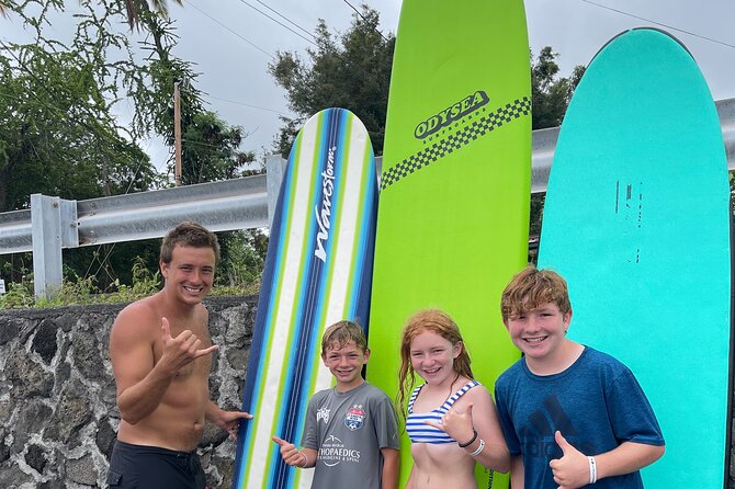 2-Hour Guided Private Surf Lesson in Kona - Getting fitted with a foam board and safety gear