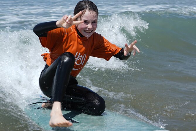 2H Surf Lesson In Agadir - Sand first: warm-up, board handling, and safety
