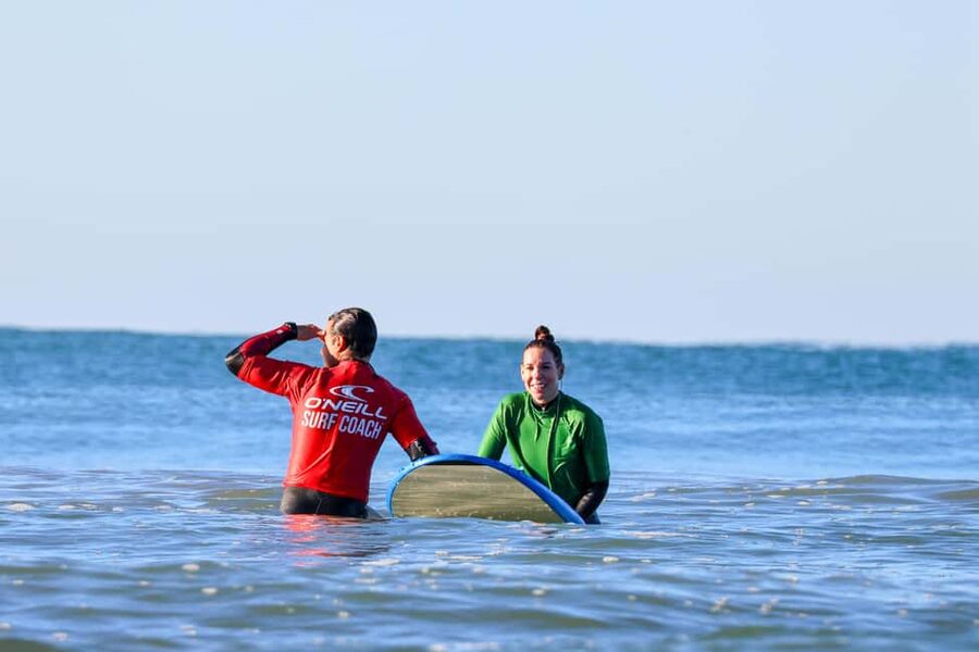 Albufeira: Learn to Surf in Chill Beach Vibes & Good Times - Starting at the yellow-logo shop near Galé Beach