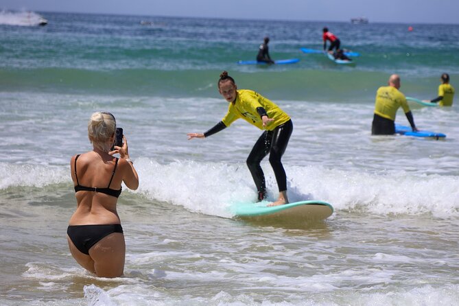 Albufeira Surf Lesson – Wetsuit & Board Included - From warm-up games to the first safety briefing