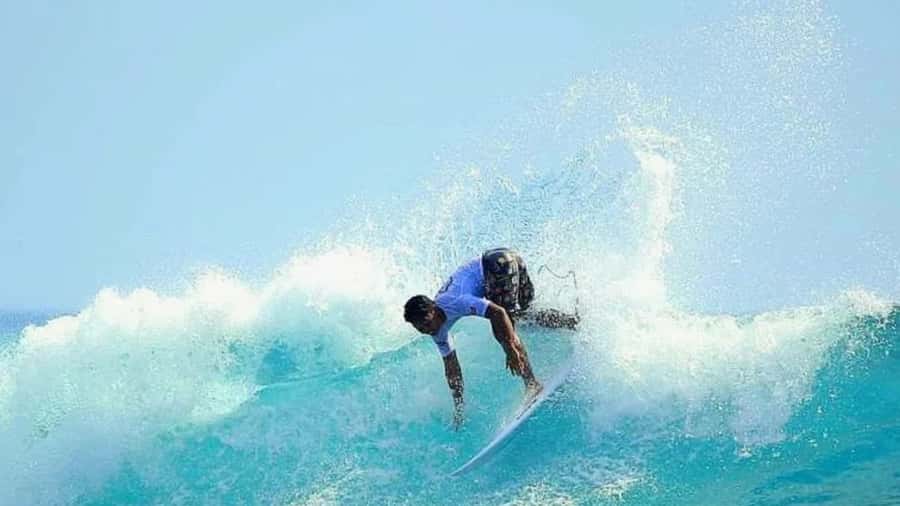 Bali: Nusa Lembongan Surf Lesson for All Levels - Getting on the board with a guide beside you