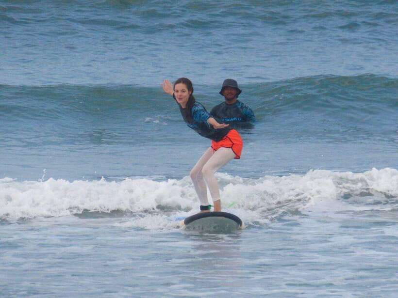 Bali: Surfing Lesson with Southern Beaches Tour & Kecak Show - Standing above the Indian Ocean at Uluwatu Temple