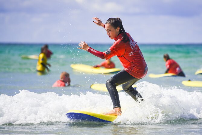 Beginner Surf Lesson in Newquay, Cornwall - Getting ready in a warm wetsuit