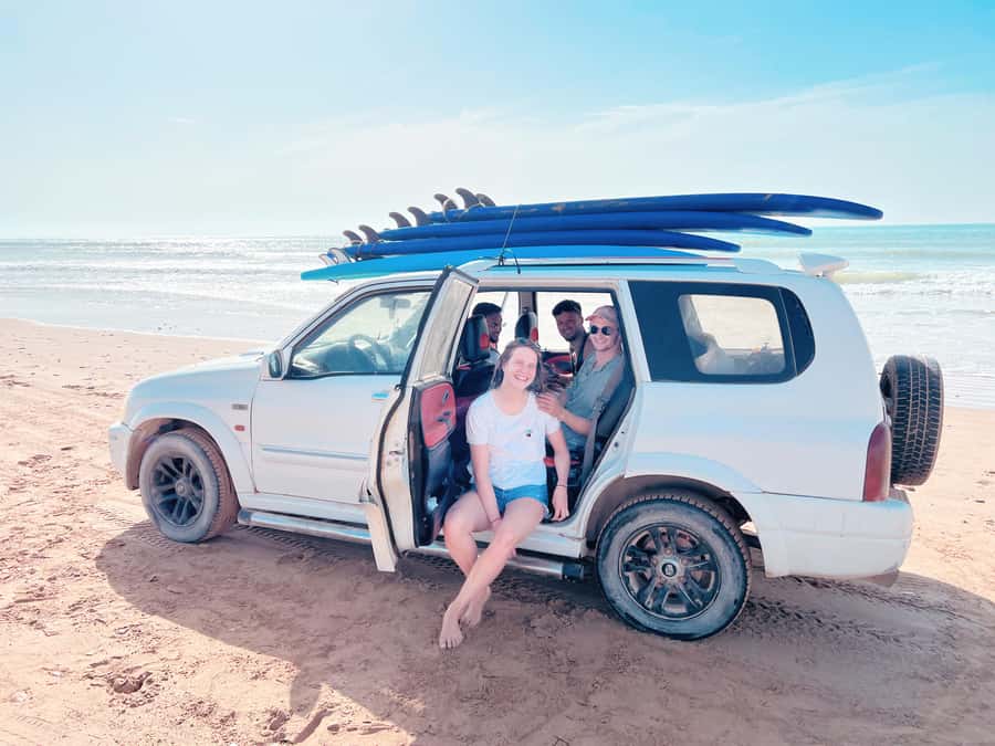 Beginners friendly surf in nice spots - Wetsuits, Warm-Up, and the First Practice on Sand