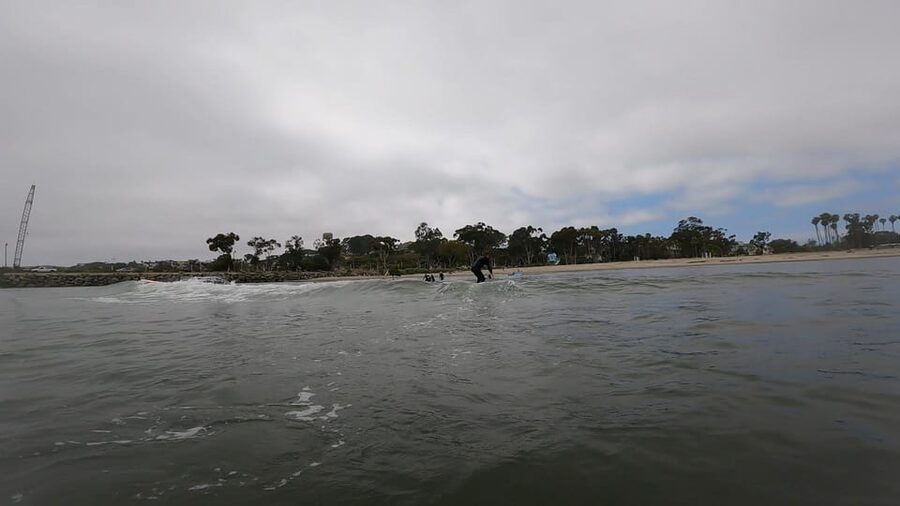 Cali: Surfing Lesson with Local Instructors - Taking the board into the Pacific