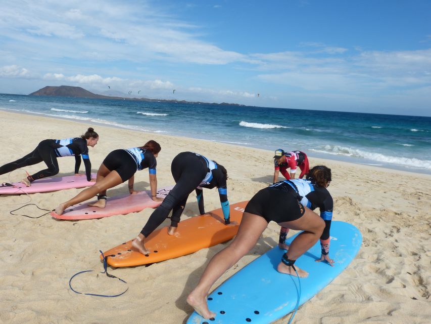 Corralejo: Surf Lessons for Beginners with Hotel Pickup - Languages, local advice, and the feel of the school