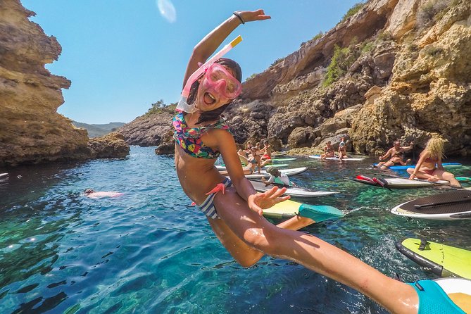 Discover the best corners of the island in paddle surf - Swimming and optional cliff jumps