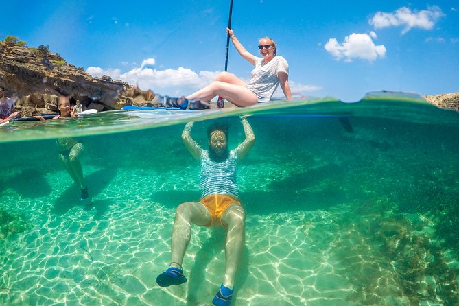 Discover the best corners of the island in paddle surf - The 9:00 am meeting and transfer to the beach