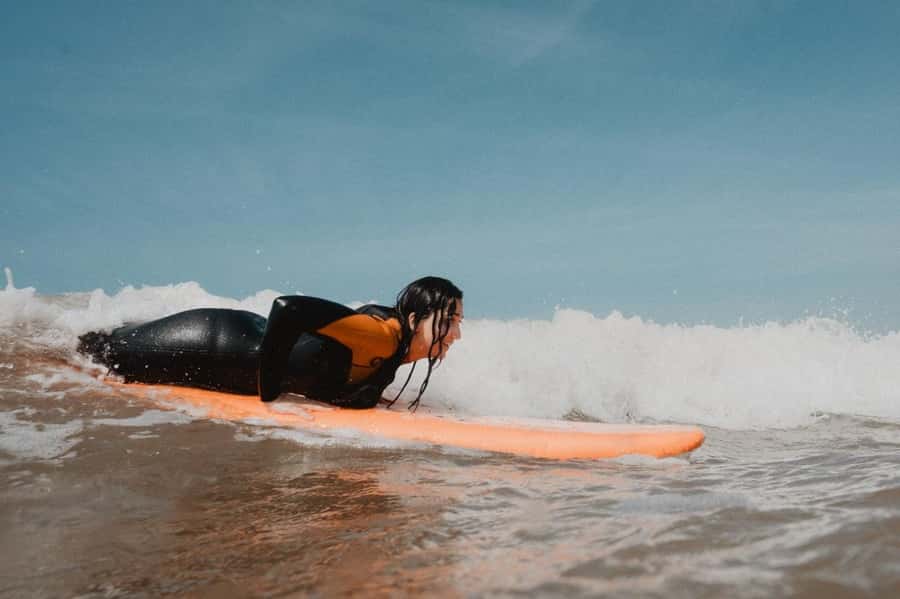 Essaouira Surf Experience –Group Lesson in Sidi Kaouki Beach - Getting into the water with the right equipment