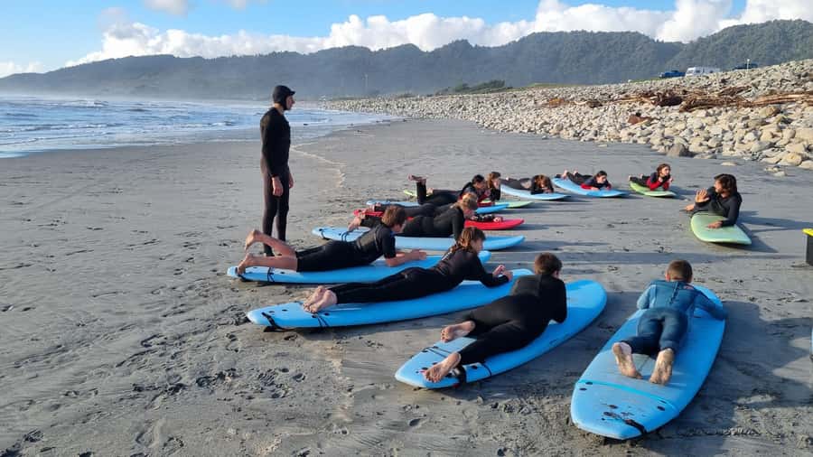 Greymouth: 2-Hour Beginner Surf Lesson - Meeting the group by the surfboard trailer