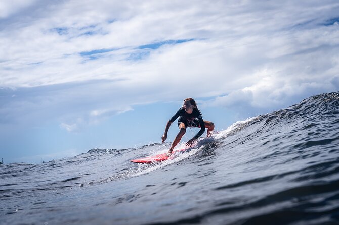 Group Guided Surfing Lesson in Tahiti - Timing, confirmation, and cancellation