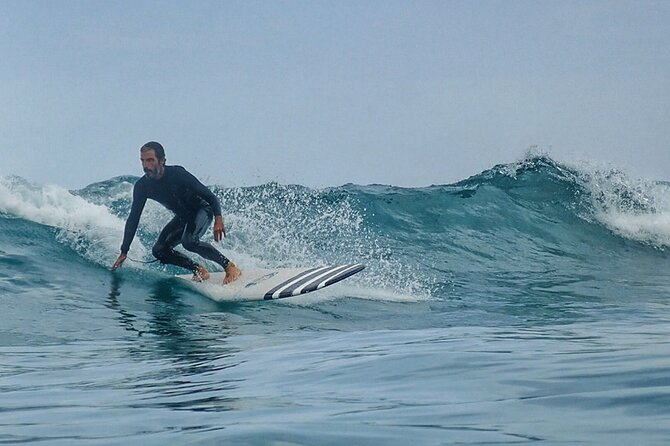 Group Longboard Surf Lesson in Lanzarote - Caleta de Famara as the meeting point