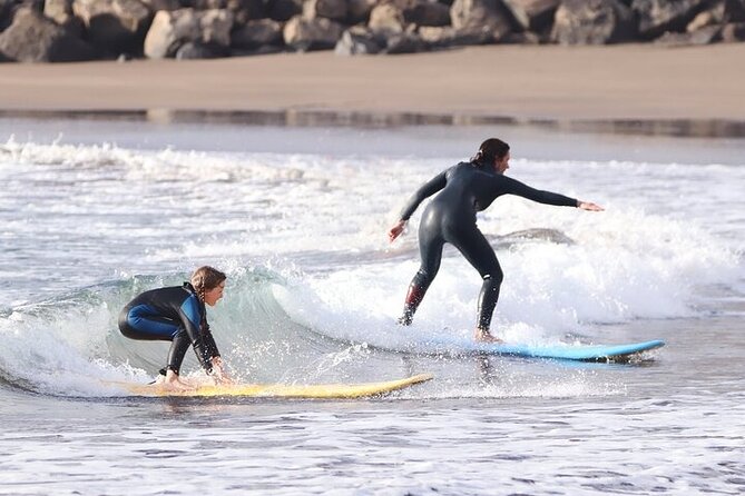 Group Surf Class in Playa de Las Américas with Photographs - The beach setting has advantages and one clear limitation