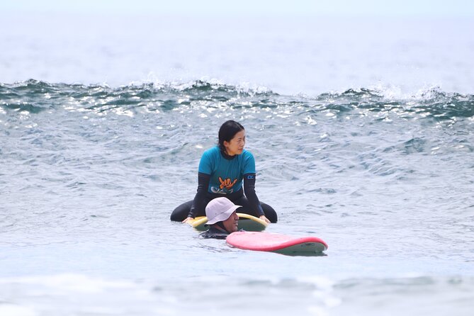 Group Surf Class in Playa de Las Américas with Photographs - Stretch, shower, snacks, and a calm finish