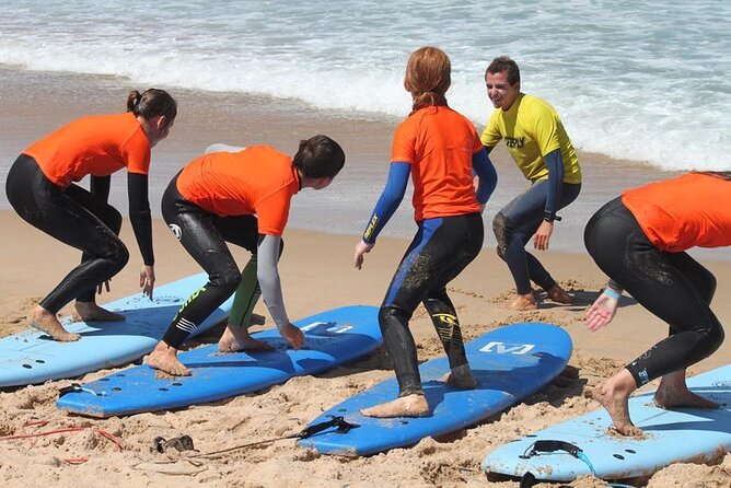 Group Surf Lesson @Praia da Rocha - Starting at Praia da Rocha with a board and a plan