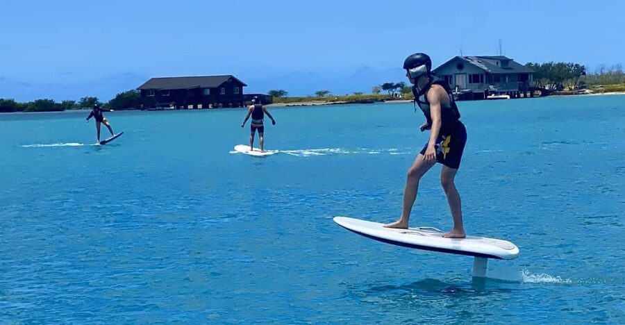 Hawaii: Electric Hydrofoil Surfing Solo Lesson - Safety gear and radio contact on the water