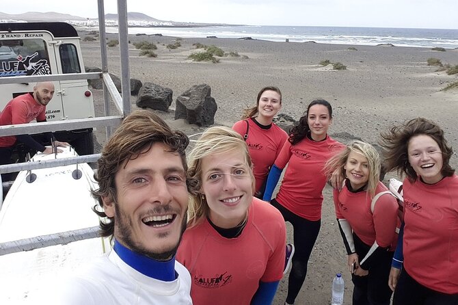 Kalufa Surf school in Caleta de Famara, Lanzarote - The first 30 minutes: wetsuits, warm-up, and ocean basics
