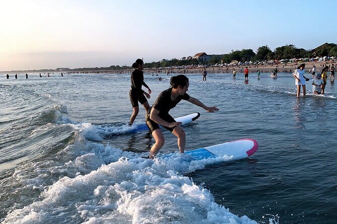 Kuta Beach Bali, 1 on 1 Surfing Lesson Orange Surf Bali - The shore lesson makes the first attempt less confusing