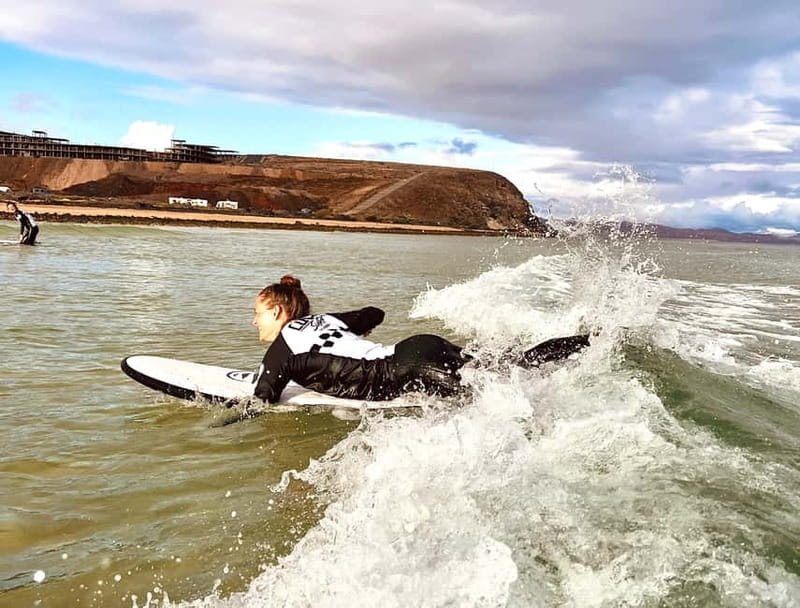 La Pared: Classic Surf Lesson in the South of Fuerteventura - Getting fitted with a wetsuit and board
