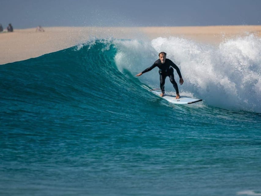 La Pared: Surf Courses for All Levels - Learning the surf basics on the beach