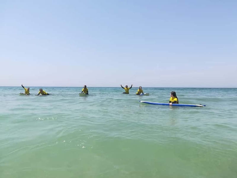 Lisbon: Surfing Lesson on Costa de Caparica Beach - Getting suited up and learning on the sand