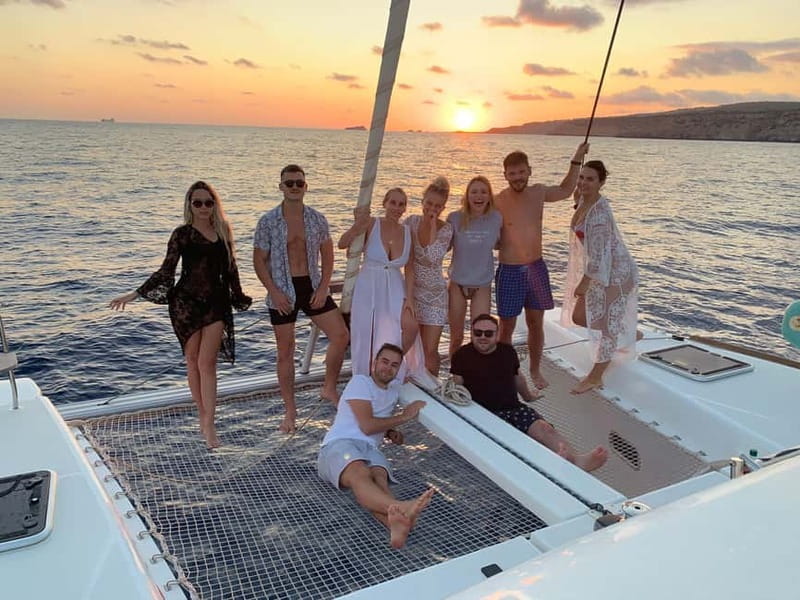 Majorca: Dinner aboard a private catamaran with snorkeling and paddle surfing - Seafood, local products, and sunset