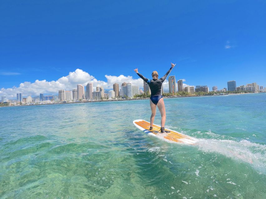 Oahu: Private Surfing Lesson in Waikiki Beach - Entering the water and learning to catch waves