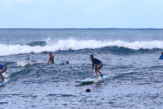 Oahu Semi Private Surfing Lesson - Getting fitted with a board and rash guard