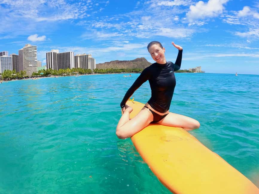 Oahu: Waikiki Beginner Private Surf Lesson- Female Guide - Paddling into Waikiki’s waves