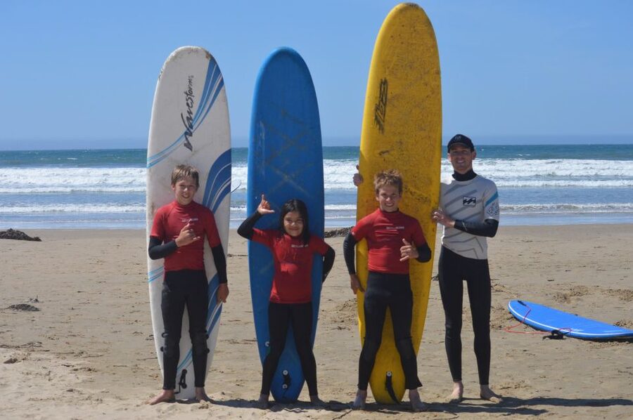 Pismo Beach: Private Group Surf Lesson- all equip included! - Getting fitted with a board and wetsuit