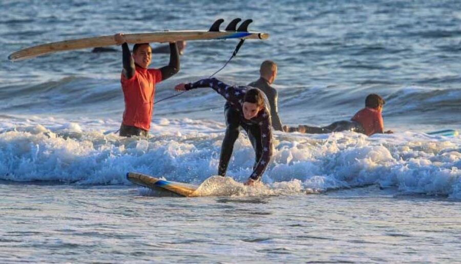 Pismo Beach: Surf Lessons with Instructor - Catching your first wave at Pismo Beach