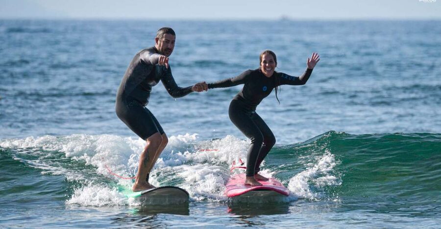 Playa de las Américas: Private or Small-Group Surf Lesson - A first surf lesson built around the tide