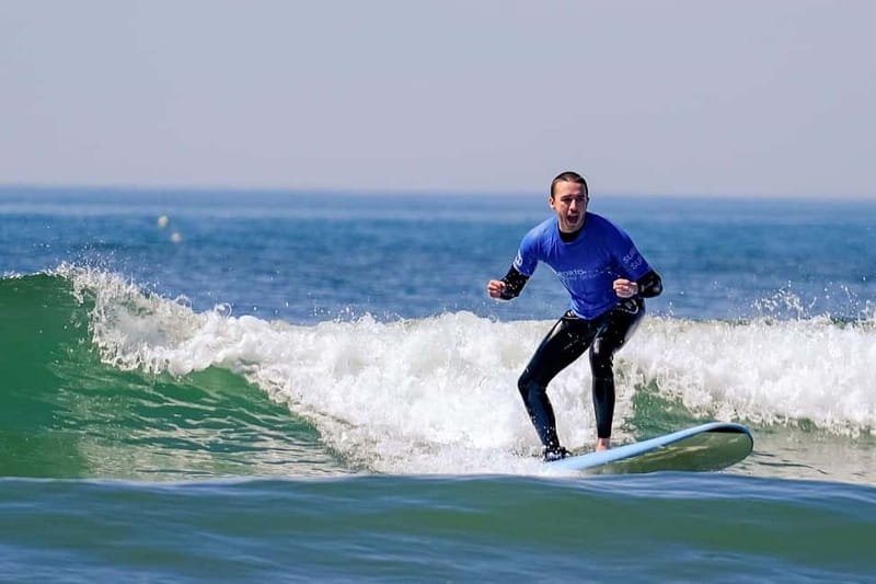 Porto: Surf Lessons with transfer at Porto Surf School - Board, wetsuit, and the practical side of the day