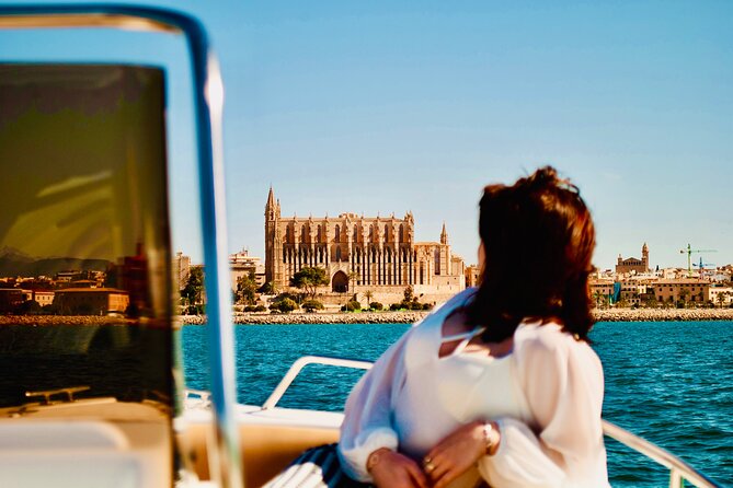 Private Boat Tour from Palma with Snorkeling and Paddle Surfing - Snorkeling in clear Mediterranean water