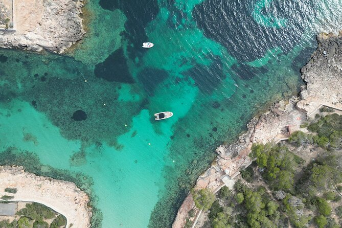 Private Boat Tour of San Antonio with Paddel surfing and Snorkeling - Cala Comte gives you the longest water stop