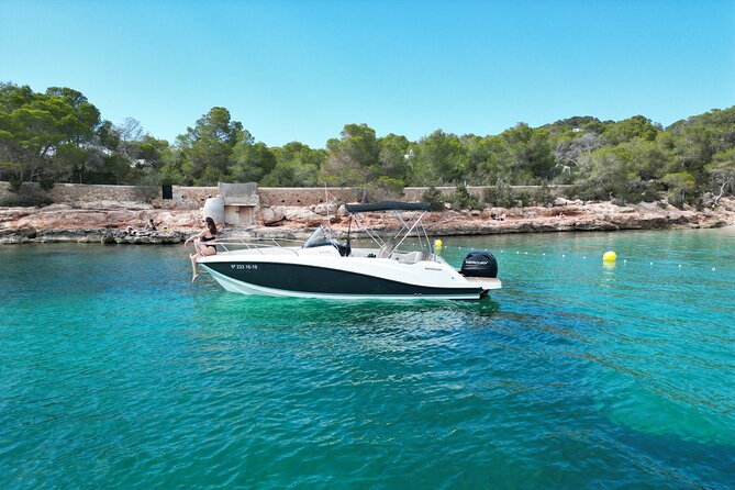 Private Boat Tour of San Antonio with Paddel surfing and Snorkeling - Water temperature, rocks, and what to bring