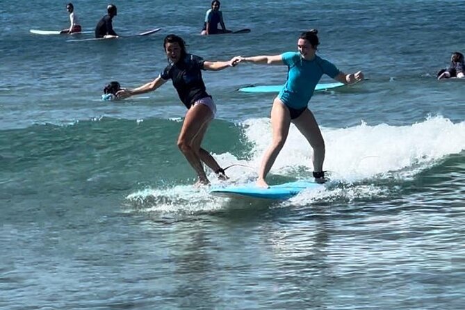 Private Duo Surfing Lesson Guadeloupe - Learning to paddle, stand, and hold your balance