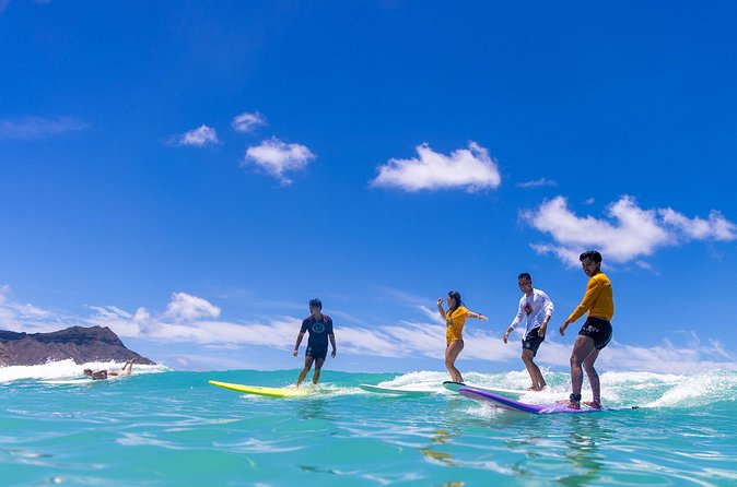 Private Group Surf Duo by Waikiki Beachboys at the Royal - Moving from the sand to the water