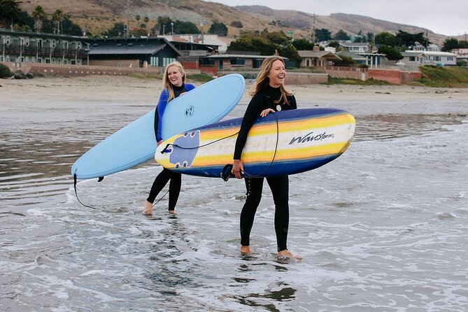 Private Surf Lesson in Morro Bay - Getting fitted for a wetsuit and longboard