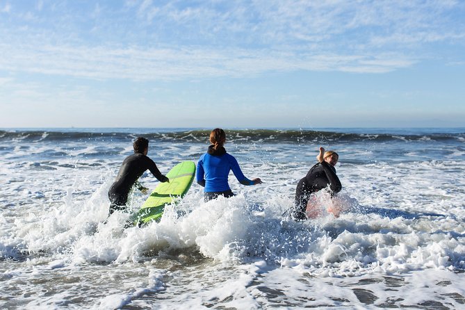 Private Surf Lesson with Instructor, Board, & Wetsuit - Swimming ability is a firm requirement