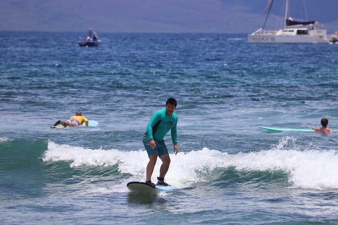Private Surf Lessons from Kaanapali Beach - Taking the board into Kaanapali Beach