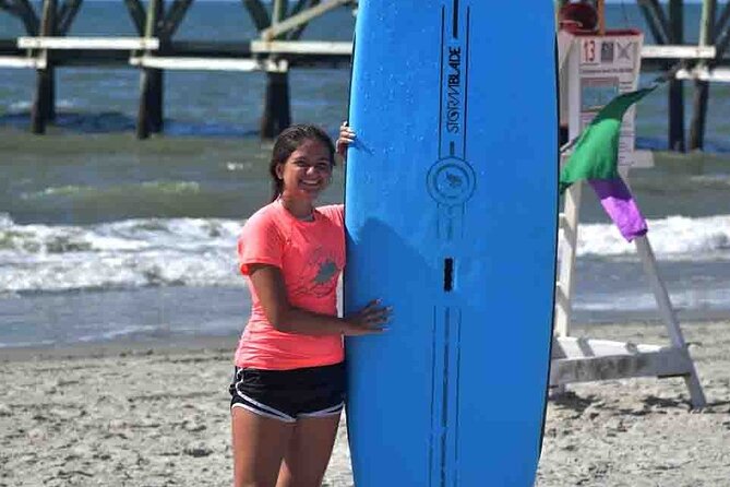 Private Surf Lessons in Myrtle Beach - Practicing the pop-up on the beach