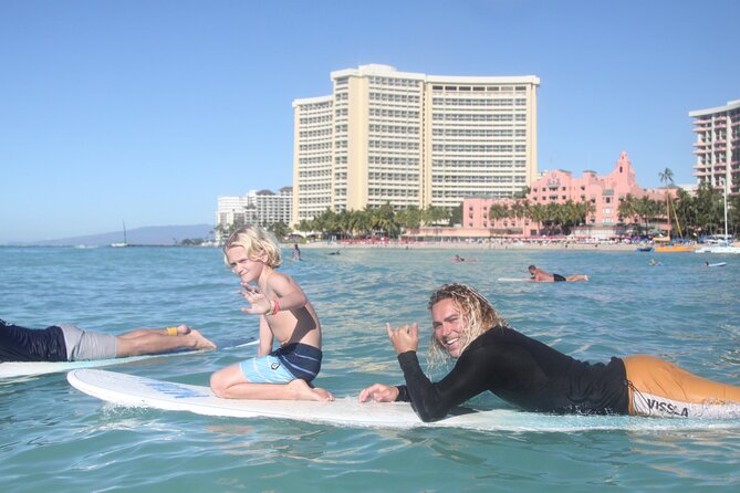 Private Surfing Lessons in Waikiki - Walking to Waikiki Beach with your board