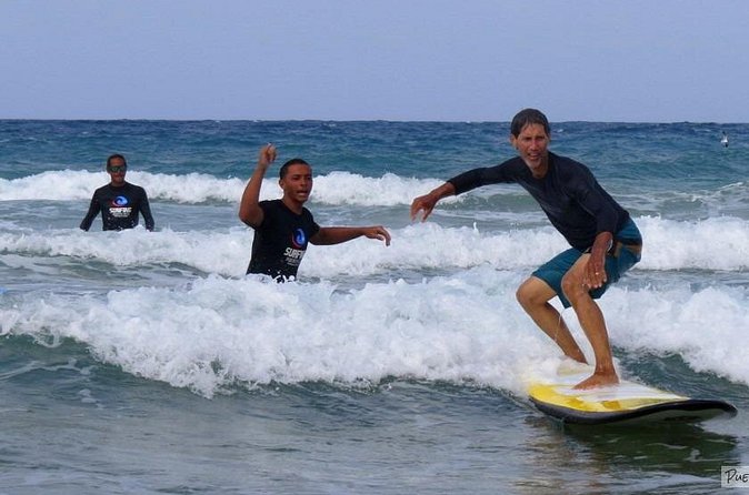 Ride the Waves in Puerto Rico-Surfing Lessons - Condado Beach versus the Old San Juan description