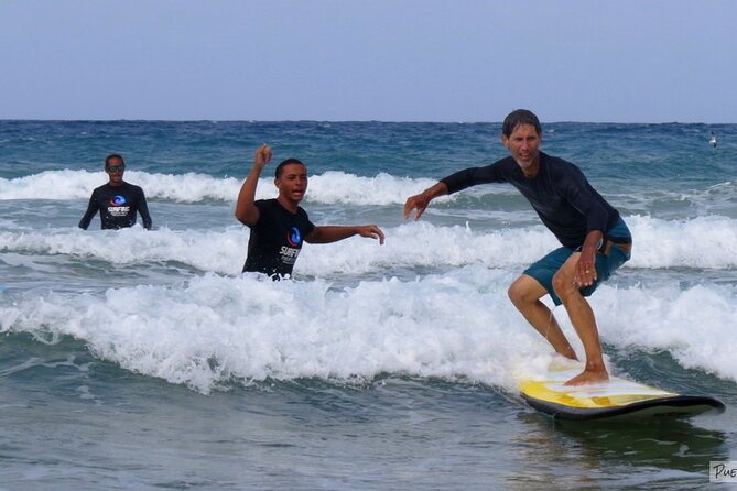 Ride the Waves in Puerto Rico-Surfing Lessons - Taking the board into the Caribbean water