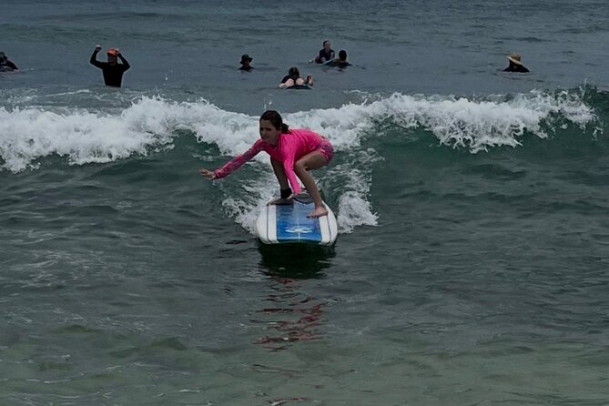 Semi Private Surf Lessons - Learning the basics with a board and leash