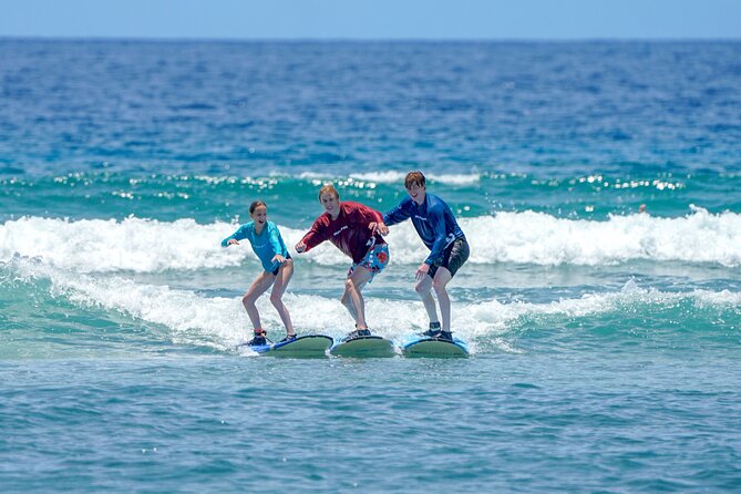 Semi Private Surf Lessons with Experienced Coaches - The beach bottom and what to wear