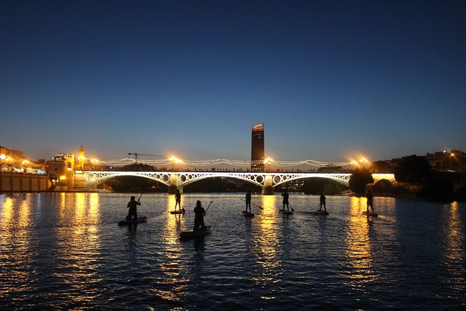 Seville: Sunset in Paddle Surf - Crossing toward Triana Bridge