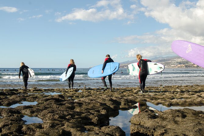 Small Group Surf Lesson in Playa de las Américas - Getting equipped before the beach